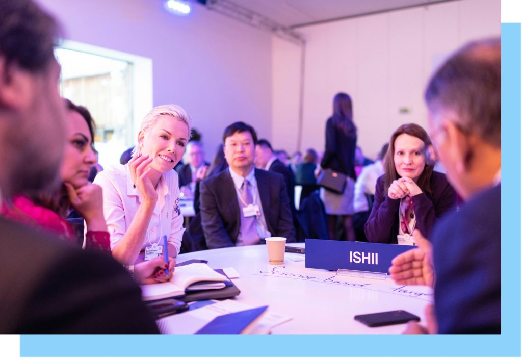 Group of people chatting at a networking event.