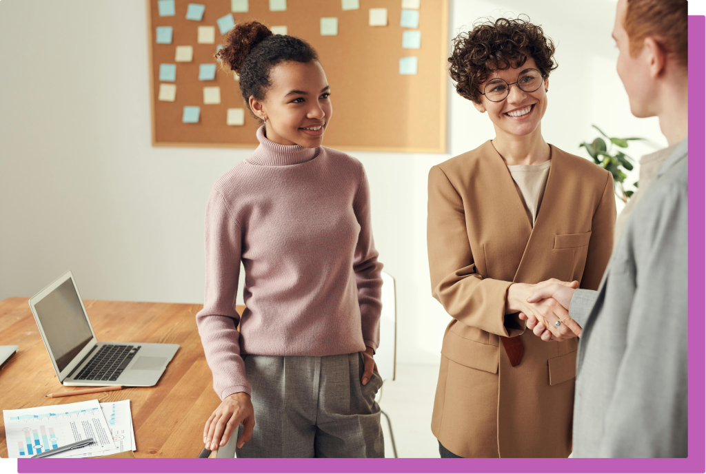 three women networking at networking event